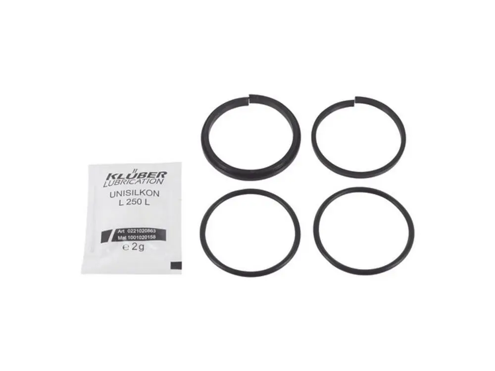 Dichtset mit vier schwarzen O-Ringen und einem kleinen Paket Klüber Lubrication Unisilkon L 250 L, geeignet für Ideal Standard Produkte.